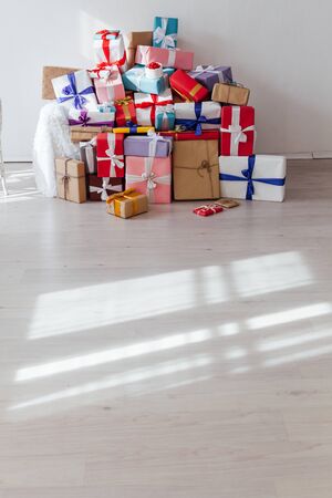 Lots of festive gifts for new year birthday or Christmasの写真素材