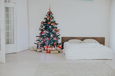 decor white bedroom with Christmas tree Christmas gifts 1