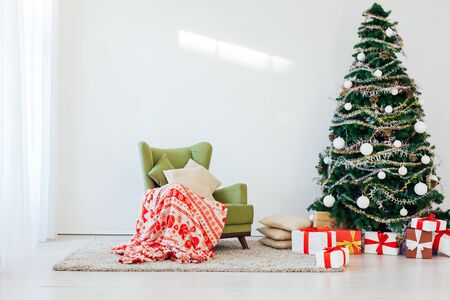 Christmas tree gifts winter background holidayの写真素材