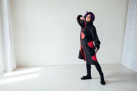 Anime cosplayer girl with purple hair superheroの写真素材