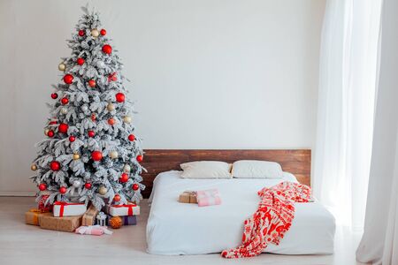 new year House bedroom bed Christmas tree holiday giftsの写真素材