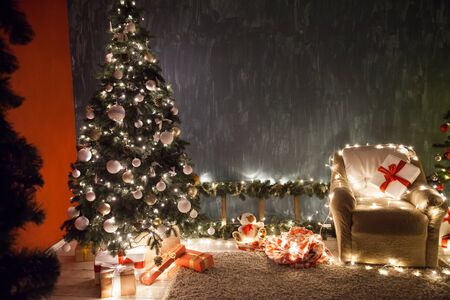 Christmas tree garland lights with New Year's eve decorationの写真素材