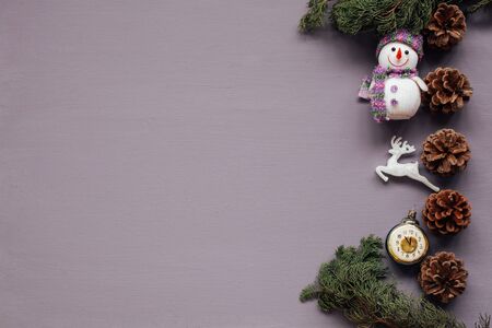 Christmas card gifts decor for the new year on a purple backgroundの写真素材