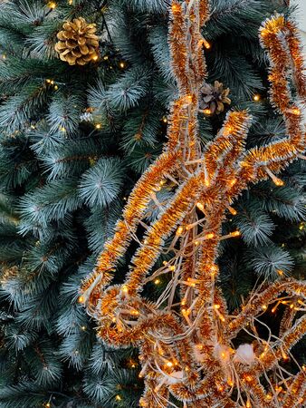 decoration of the Christmas tree with toys and giftsの写真素材