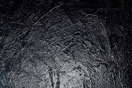 Black wall texture shine a backgroundの写真素材