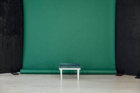 one chair in the interior of the room with a green backgroundの写真素材