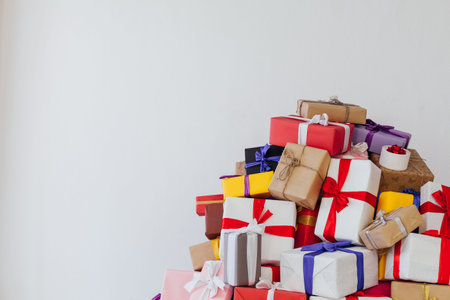 lots of multicolored Christmas gifts new year white backgroundの写真素材