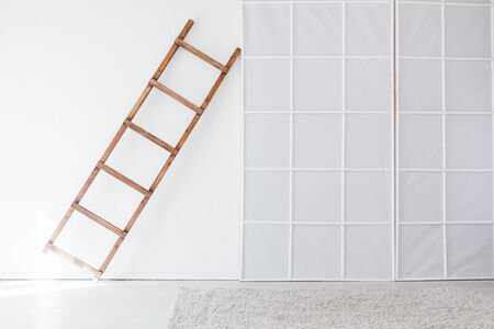 wooden staircase in the interior of an empty roomの写真素材