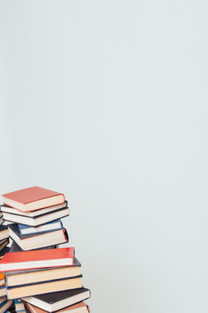 lots of stacks of books to teach in the library on a white background