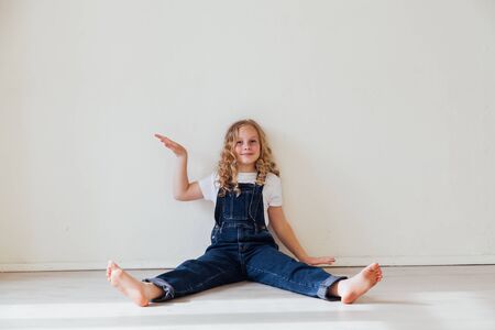 beautiful girl 10 years old in denim clothesの写真素材