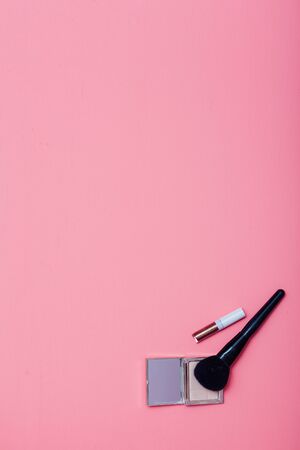 Makeup makeup lipstick on a pink backgroundの写真素材