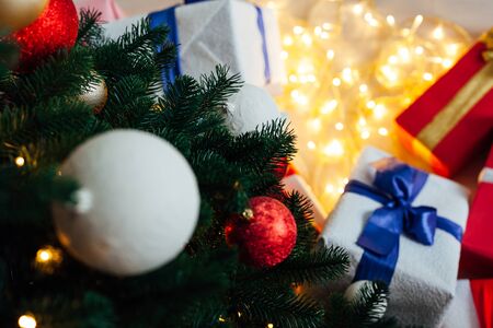 Christmas tree with gifts of the new year decor holidayの写真素材