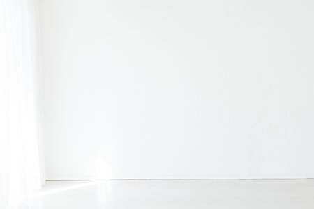 interior of an empty room with a windowの写真素材