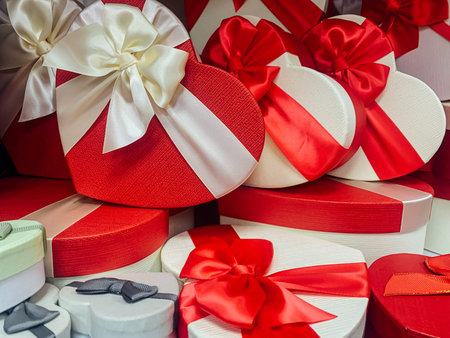 lots of red white gifts in the shape of a heart for the holiday
