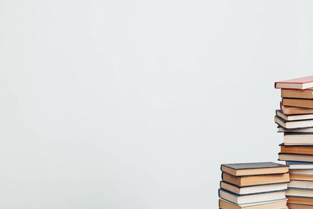 many stacks of educational books to prepare for exams in the university libraryの写真素材