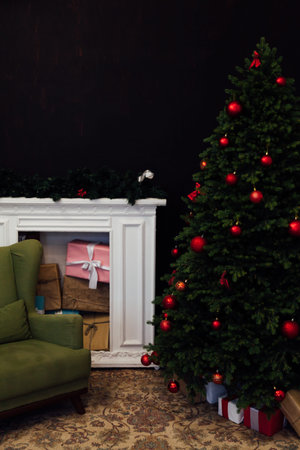 The interior of the black room is a green Christmas tree with red gifts for the new year decor...