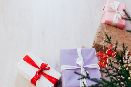 lots of Christmas gifts for the new year decor white interior as a background
