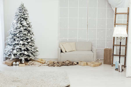 white snowy Christmas tree decor home New Year postcardの写真素材