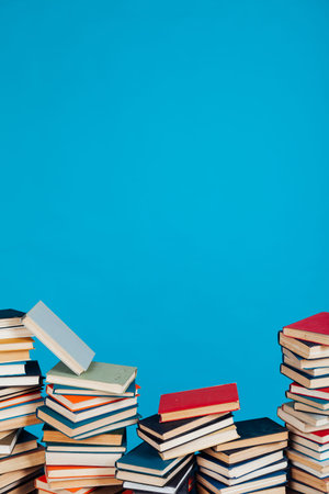 many stacks of educational books to study in the university library as a background