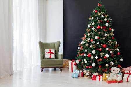 New Years Home Christmas Tree with gifts decor holiday black backgroundの写真素材