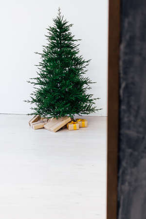 Christmas tree with decorations and gifts new holiday yearの写真素材