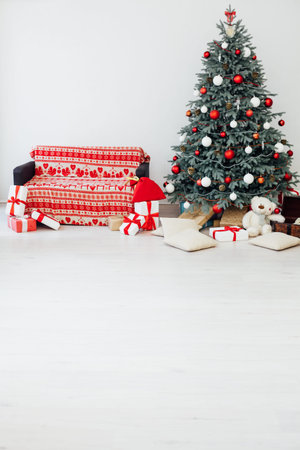 Christmas tree pine with red gifts decor new year feast winter backgroundの写真素材