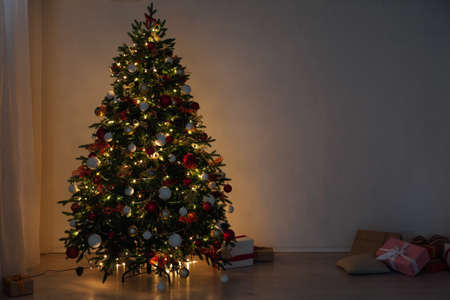 Christmas tree lights light garlands new years eve presentsの写真素材