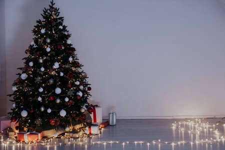 Christmas tree lights light garlands new years eve presentsの写真素材