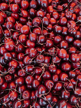 lots of ripe fruit sweet cherries for cooking as a backgroundの写真素材