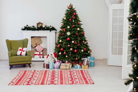 Decor new year interior of the christmas tree decor presents the holidayの写真素材
