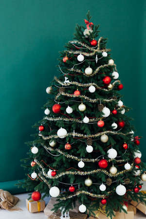 New Years decor holiday Christmas interior of the Christmas tree pine tree giftsの写真素材