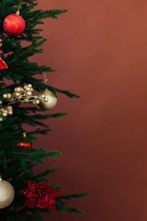 Christmas tree twigs with decor balls for new year place for inscriptionsの写真素材