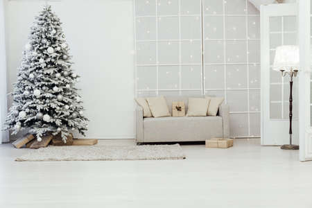 room decorated for the Christmas holidays new year tree giftsの写真素材