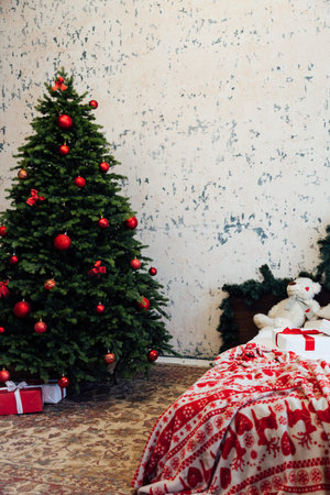 Christmas bedroom interior with bed Christmas tree presents new year as background