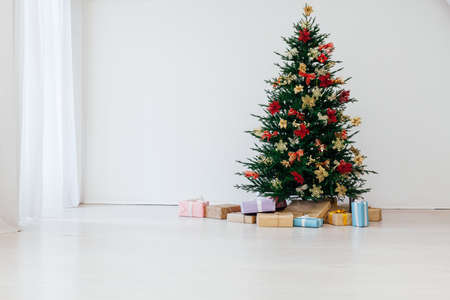 Christmas tree with gifts interior decor for the new yearの写真素材