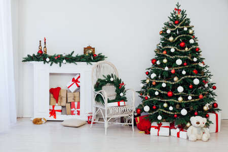 Christmas interior white Christmas room Christmas tree with gifts new year decor Decemberの写真素材