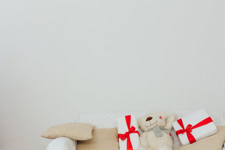 Beautiful Christmas interior pillows with gifts new year decor Decemberの写真素材