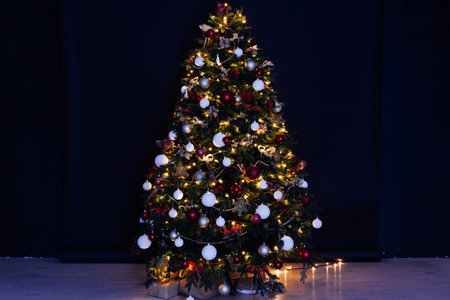 Christmas tree lights garland decor New Years Night feastの写真素材