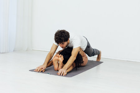 Male and female doubles yoga asana gymnastics fitness