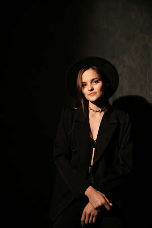 beautiful fashionable woman in lingerie in the twilightの写真素材