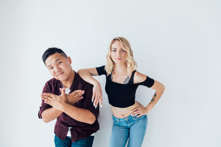 beautiful man and woman joint portrait on a light backgroundの写真素材