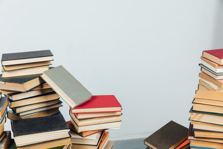 Stacks of books for teaching knowledge library university school white backgroundの写真素材