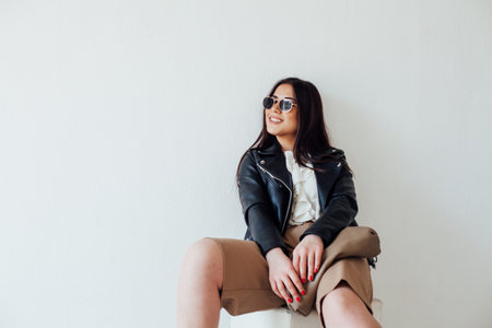 portrait of a beautiful fashionable woman brunette of oriental appearance