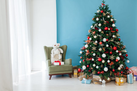 lights garland Christmas tree with gifts New Year