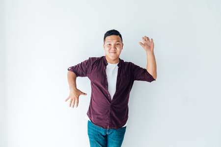 portrait of male asian dancer on white backgroundの写真素材