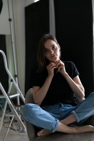 portrait of a beautiful fashionable young woman in jeans and t-shirt
