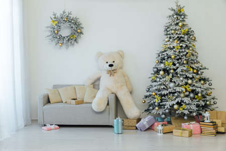interior of the house with a white Christmas tree with gifts new yearの写真素材