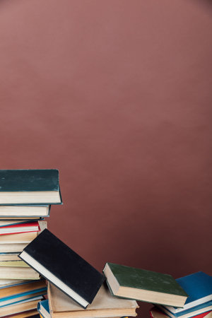 educational books for training in the college library on a brown background