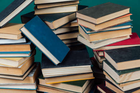 many educational books for college university studies as a backgroundの写真素材