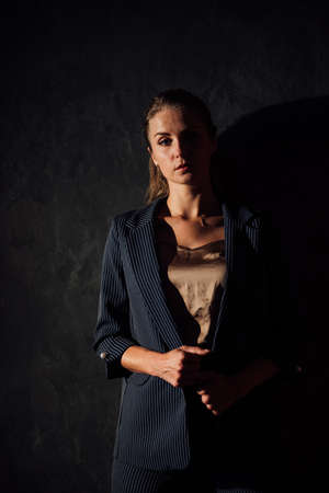 beautiful fashionable blonde woman in a business suitの写真素材